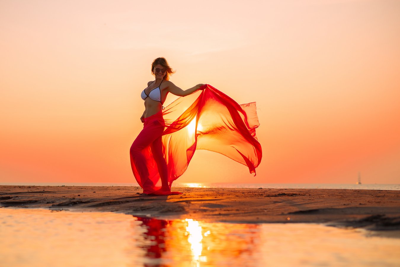 Woman Posing on the Beach at Sunset